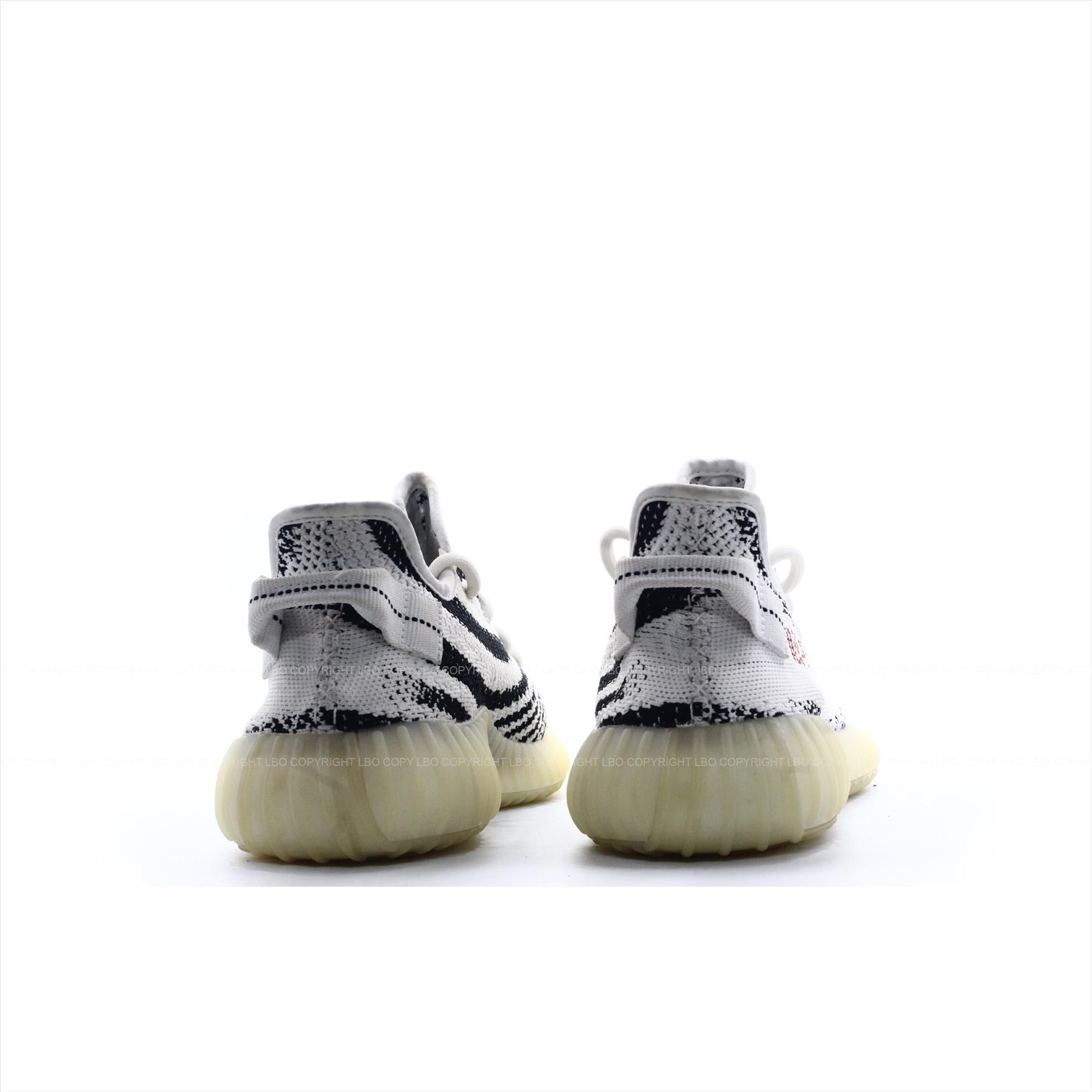 Adidas yeezy shelling zebra precio original crucigrama